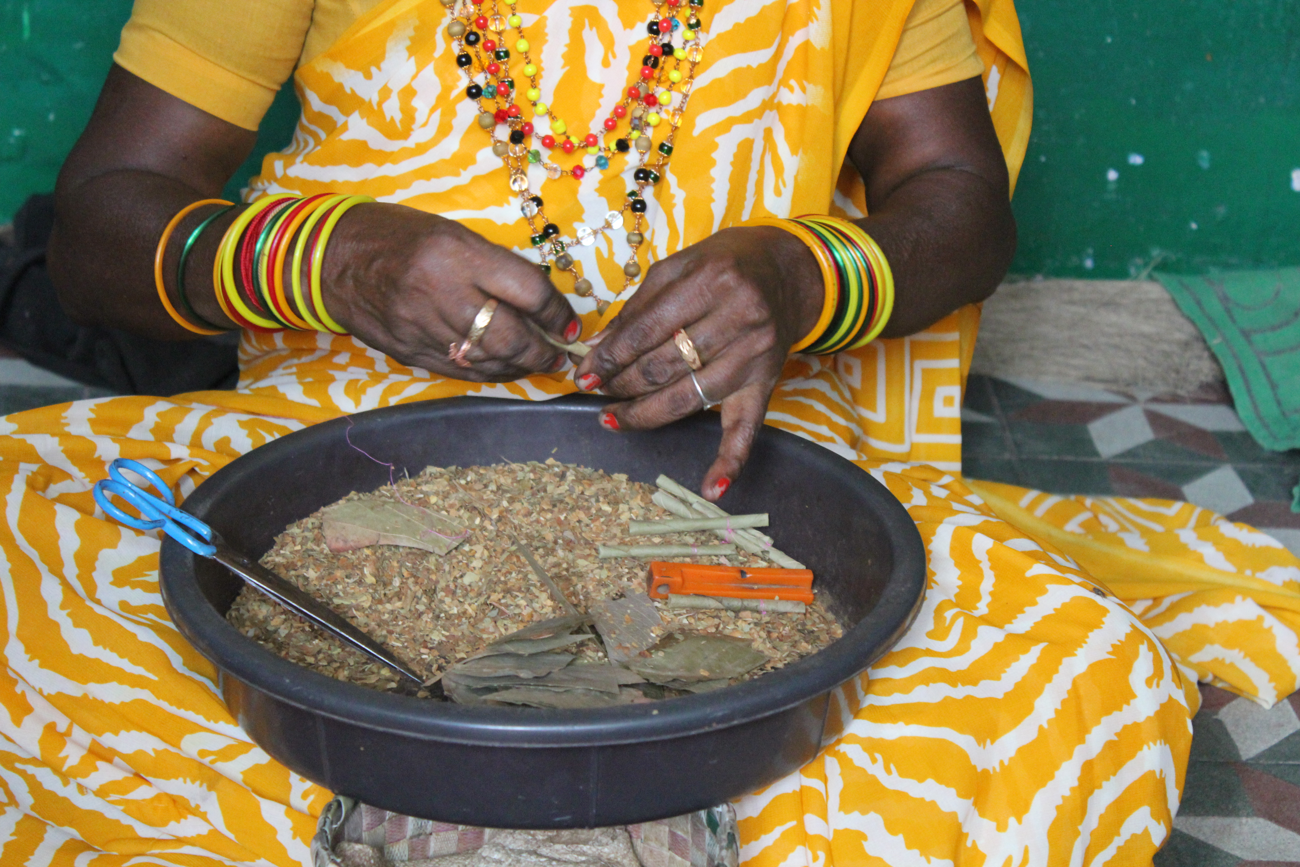 Woman rolling Beedi - Then